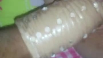 Thick cock sleeve rapped in studded cock sleeve in pink pussy