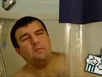 Obese man masturbates in shower with axe body detailer